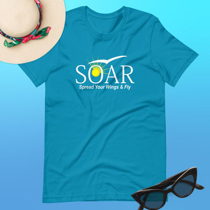 "Aqua T-Shirt with 'SOAR' Emblem - Feel the Freshness of Flight with Sun and Seagull Motif. 'Spread your wings & fly' - Available at PuraFashions.com. Flat-lay image showcasing the front design."