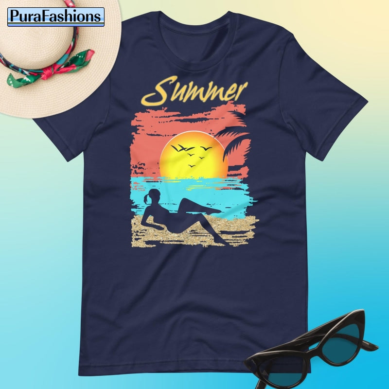 "Dive into summer vibes with our classic navy blue T-shirt featuring a tropical beach design and the word 'Summer' in bold lettering. Embrace coastal charm with every wear. Available now at PuraFashions.com."