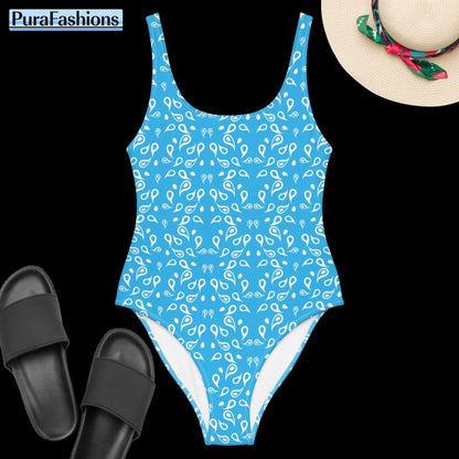 "Refreshing elegance: PuraFashions.com presents a one-piece swimsuit adorned with a playful raindrops pattern on a serene sky blue background, laid flat to reveal its charming design and summery allure."