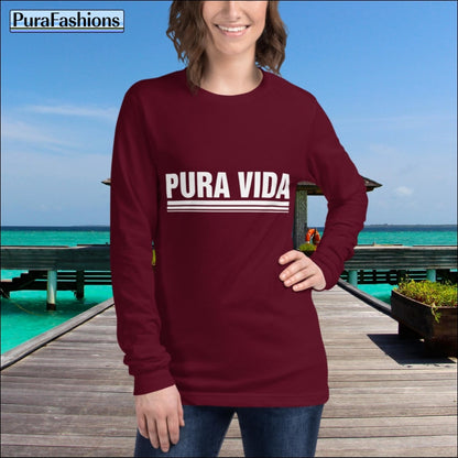 "Embrace the 'Pura Vida' lifestyle in this stylish maroon long sleeve tee. Perfect for adding a pop of color to your wardrobe while spreading positive vibes. Get yours today at PuraFashions.com!"