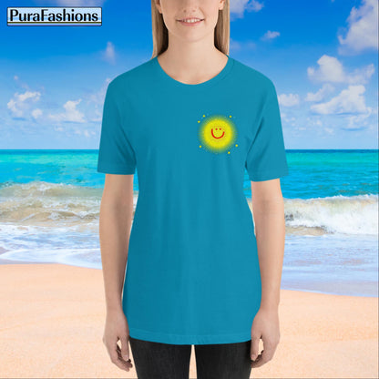 "Front view of a woman wearing an aqua T-shirt with a small happy face sun and a few stars on the chest. The T-shirt also features a large happy face sun, stars, and the text 'You're My Sunshine' on the back. Available at PuraFashions.com."