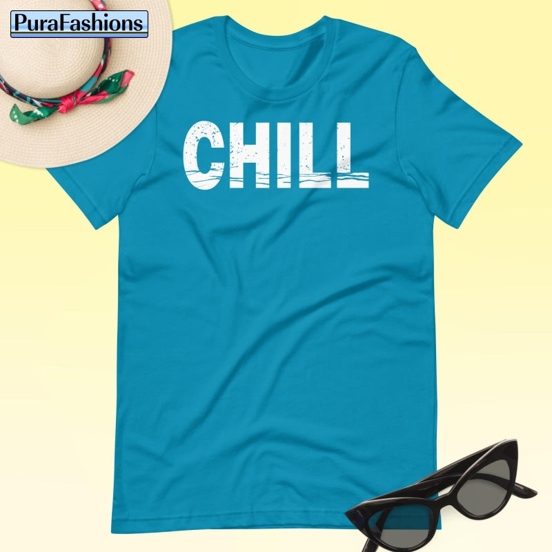 "Unwind in style with our aqua 'CHILL' tee! Perfect for laid-back days. Find it at PuraFashions.com 💧 #RelaxInStyle #ChillVibes"