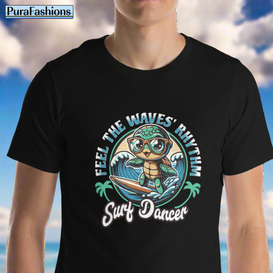 A man wearing a black T-shirt featuring a vibrant design of a turtle riding a wave on a surfboard. The text above the design reads "Feel the Wave's Rhythm" and the text below reads "Surf Dancer". Available at PuraFashions.com.