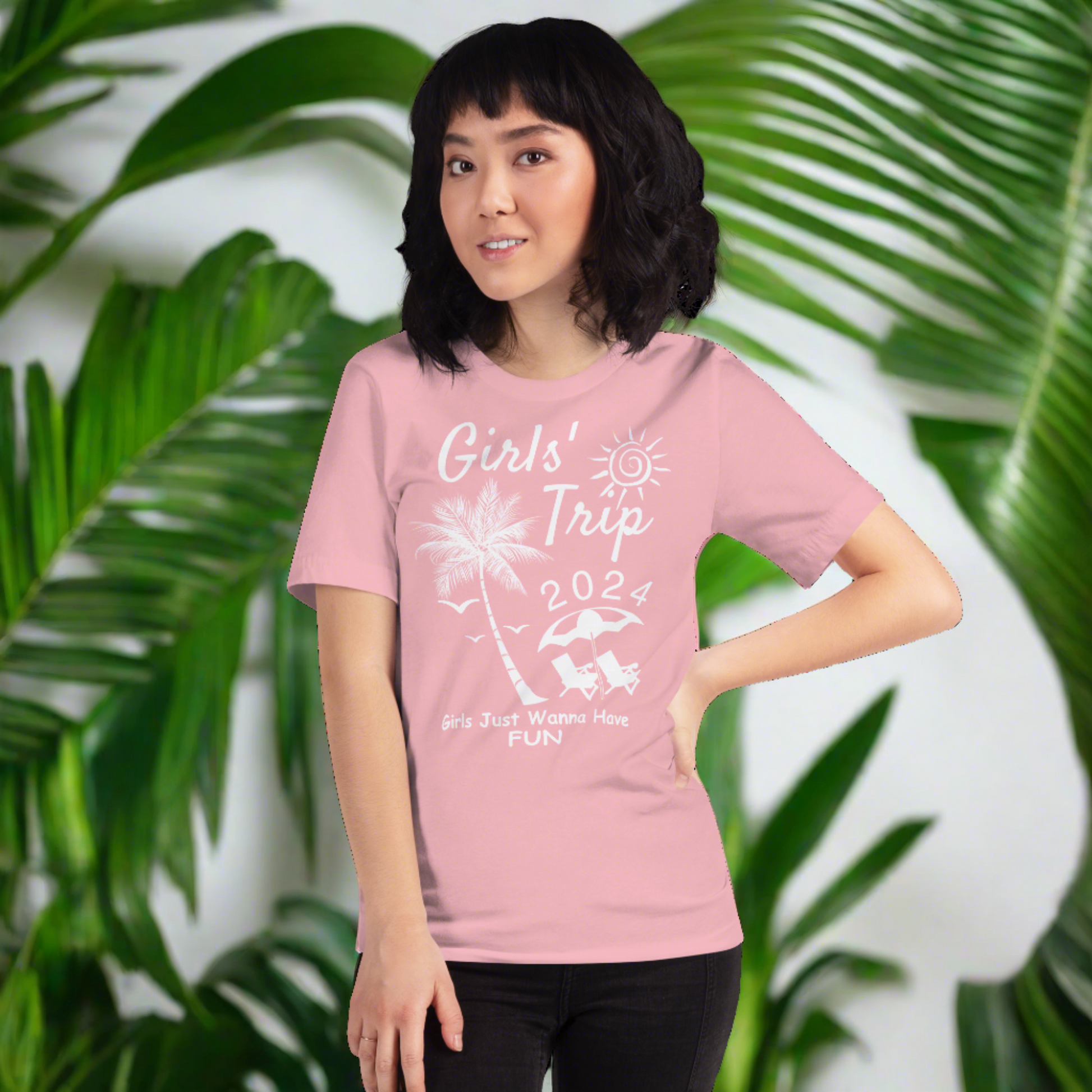 "Pretty in Pink: Girls Trip 2024 Edition! Radiate joy in our delightful pink tee adorned with the exclusive Girls Trip 2024 design. Discover your perfect shade of happiness at PuraFashions.com and make every adventure memorable!"