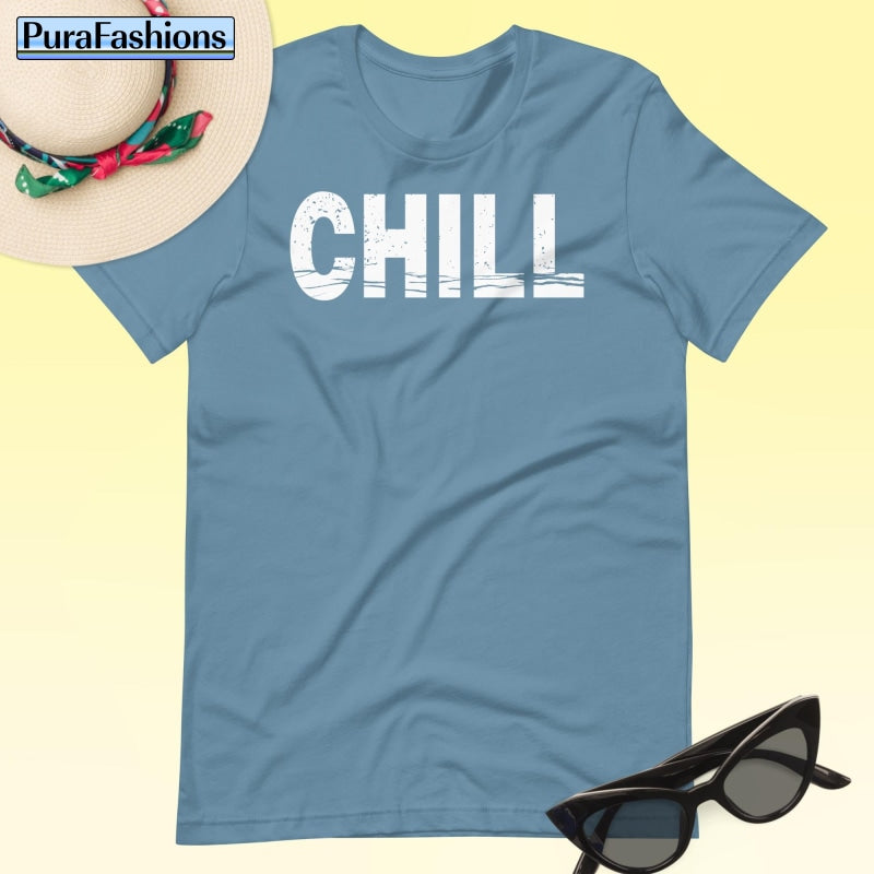 "Find serenity in our steel blue 'CHILL' tee! Effortlessly stylish and perfect for your laid-back moments. Available now at PuraFashions.com 🌀 #StayChill #CasualCool"